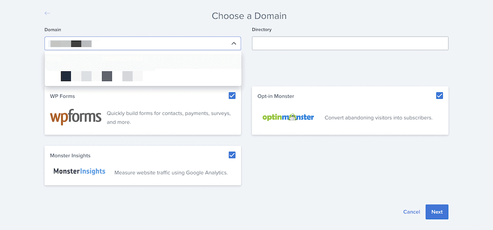 Choosing a site domain and selecting additional plugins within Bluehost.