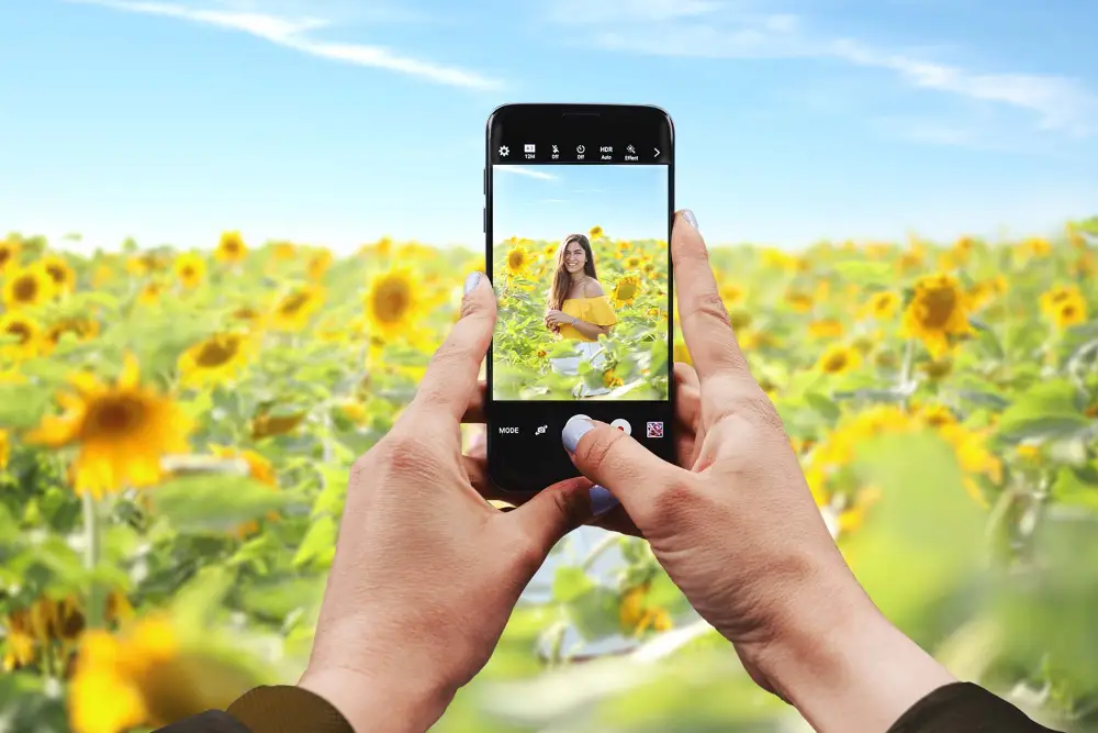 free iphone taking a picture mockup (psd) - 