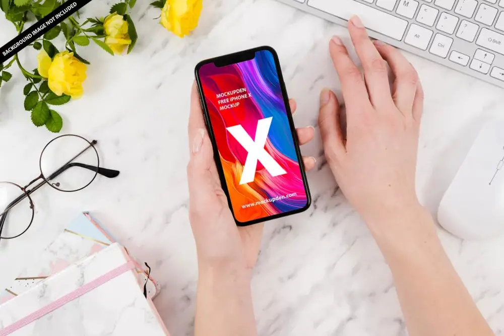 Free iPhone X Mockup in Hand PSD Template - 